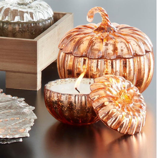 Velas Vertidas En Calabazas De Vidrio