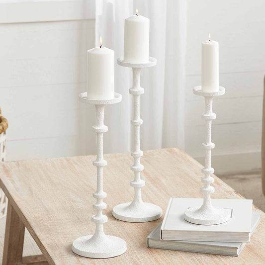 Candelero de metal blanco