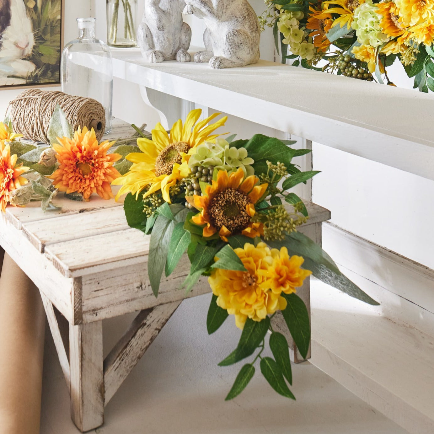 Rama de girasol y hojas