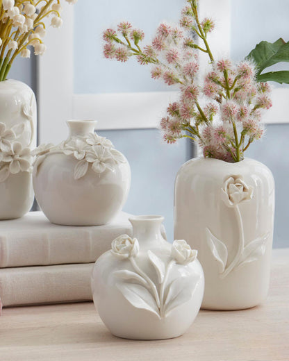 Floreros redondos de ceramica con flor resaltada