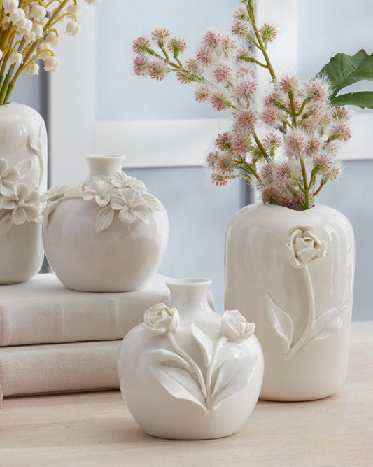 Floreros redondos de ceramica con flor resaltada