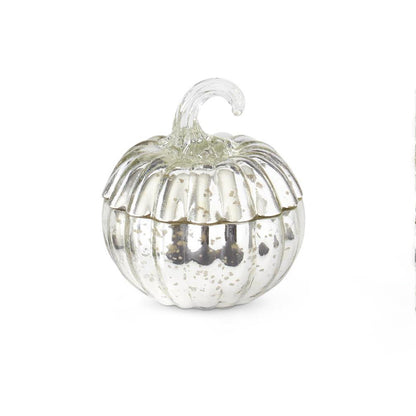 Velas Vertidas En Calabazas De Vidrio