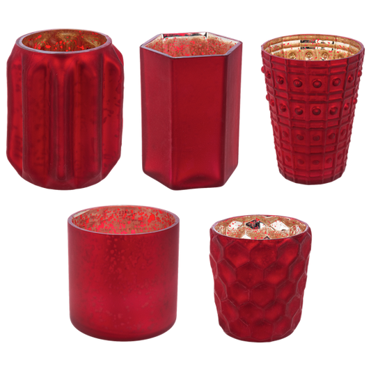 Candeleros pequenos rojos de vidrio